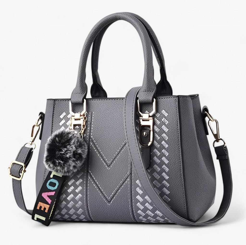 Stylische Leder-Messenger-Tasche mit weichem Pompon