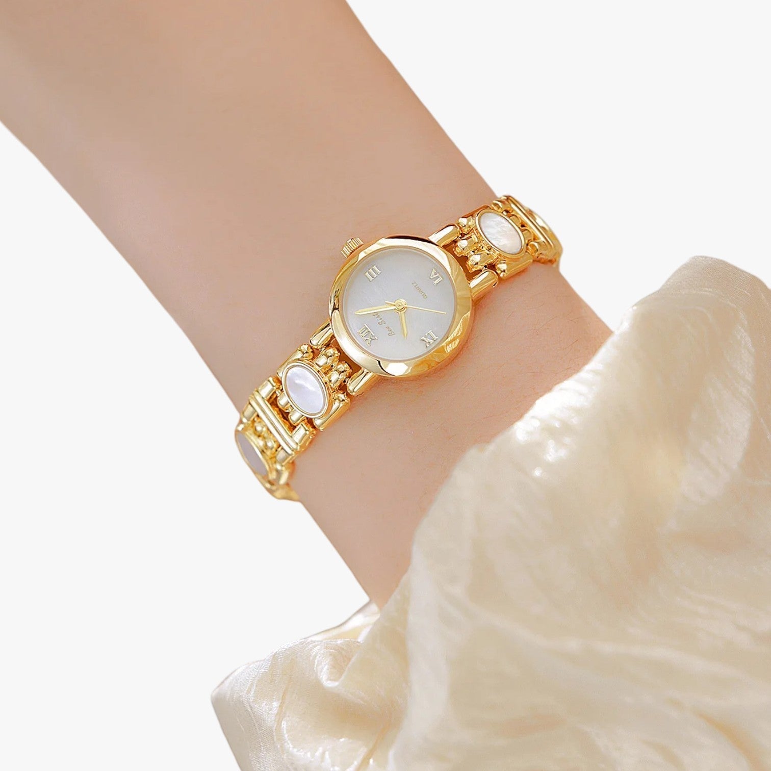 Mira | Elegante Armbanduhr mit Perlmutt-Muschelhalsband
