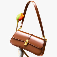 Alaia | Luxus-Ledertasche Baguette in echtem Leder